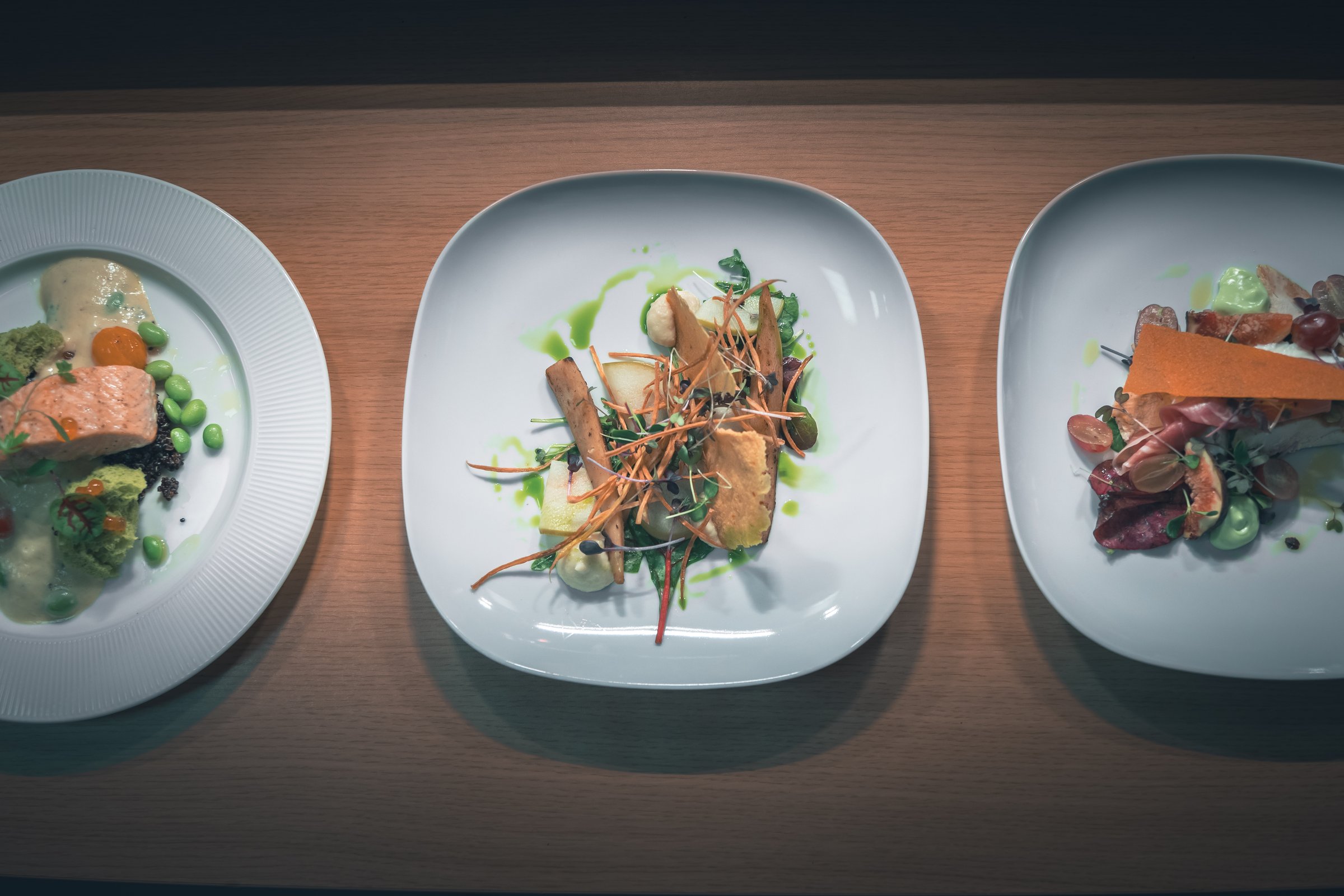 Three fine-dining plates prepared by BHMS culinary students