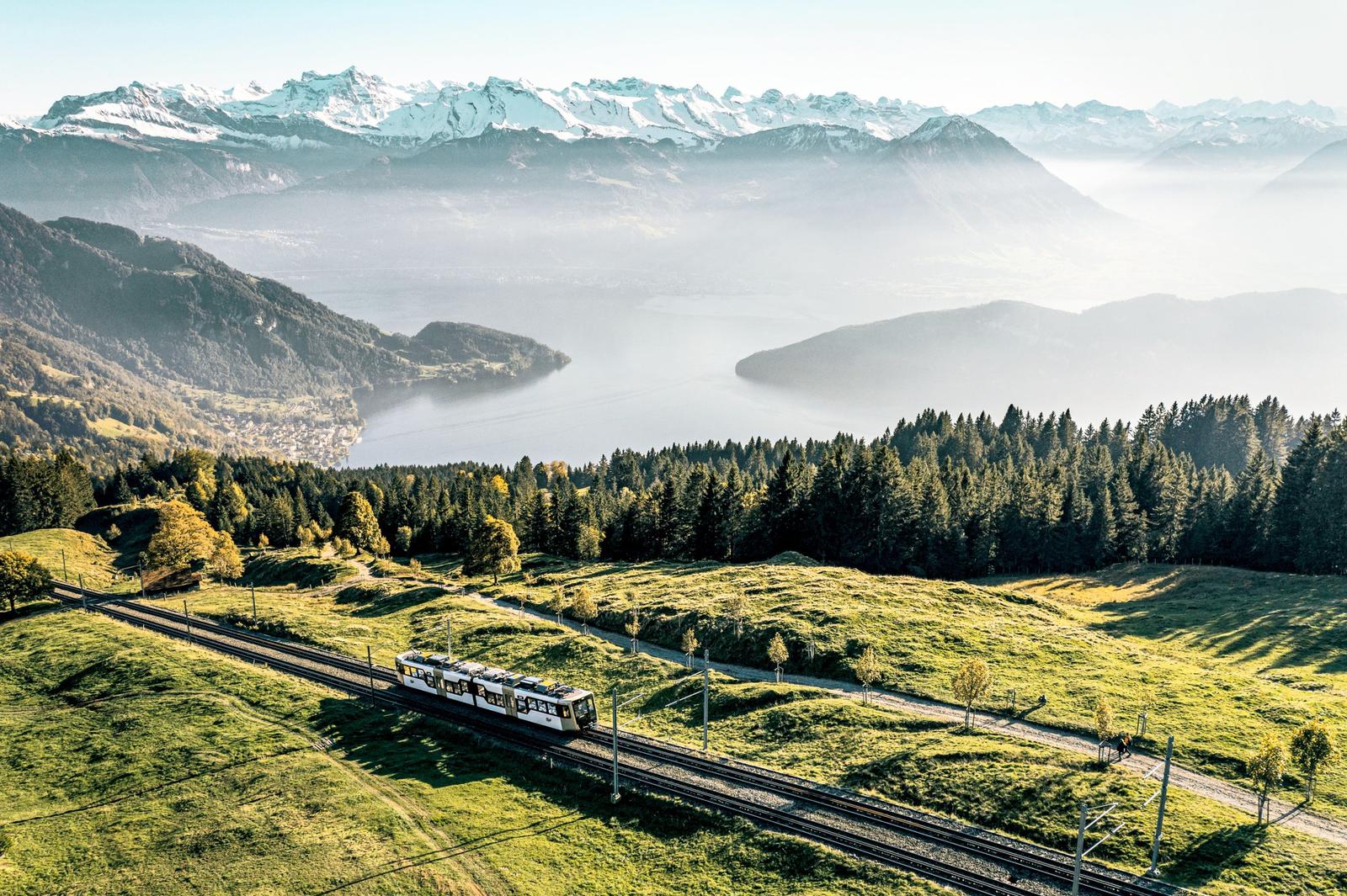 Rigi cogwheel railway climbing above Lake Lucerne