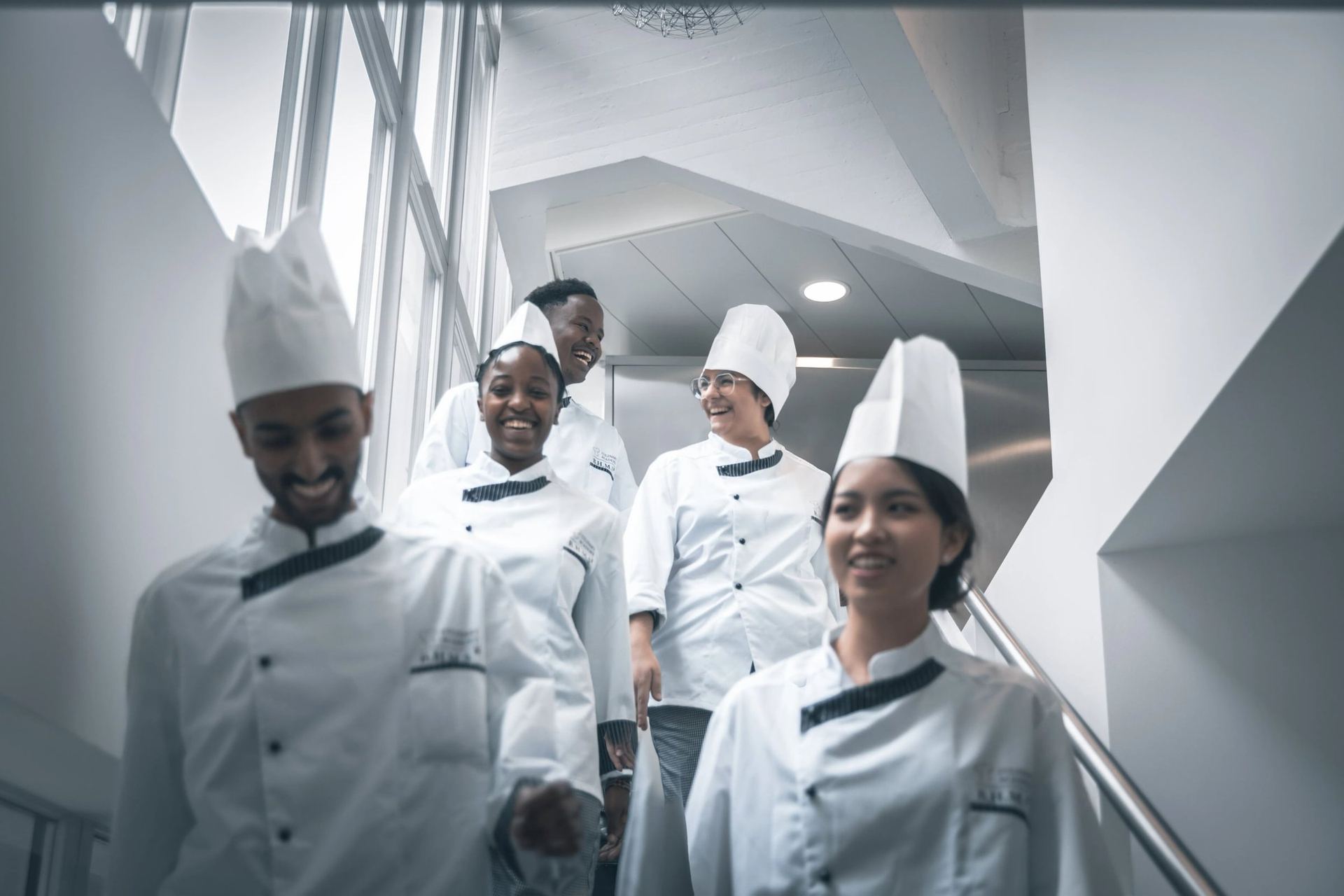 International BHMS culinary students in chef whites
